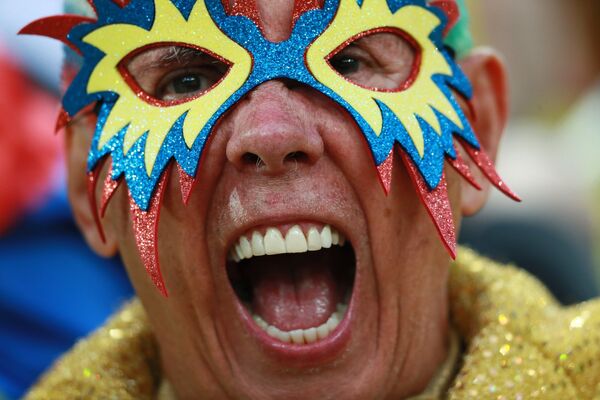 Un hincha de la selección nacional colombiana antes del partido de los octavos del final entre Colombia e Inglaterra Un hincha de la selección nacional colombiana antes del partido de los octavos del final entre Colombia e Inglaterra - Sputnik Mundo