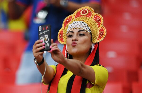 Una hincha de Colombia Una hincha de Colombia - Sputnik Mundo