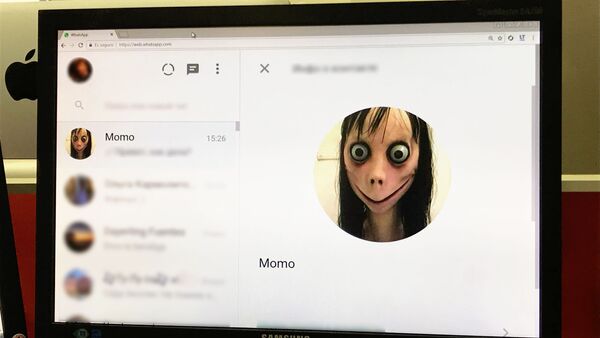 Cuenta de 'Momo' en la aplicación de mensajería instantánea WhatsApp - Sputnik Mundo