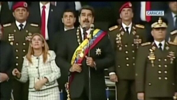 Momento de la explosión que interrumpió el discurso de Nicolás Maduro - Sputnik Mundo