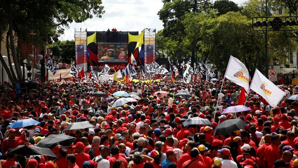 Una manifestación en apoyo al presidente de Venezuela, Nicolás Maduro - Sputnik Mundo