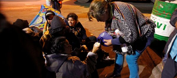 Migrantes venezolanos en Ecuador Migrantes venezolanos en Ecuador - Sputnik Mundo
