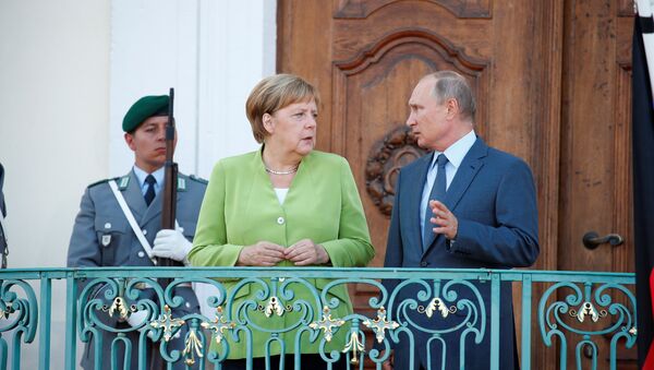 Angela Merkel y Vladímir Putin - Sputnik Mundo