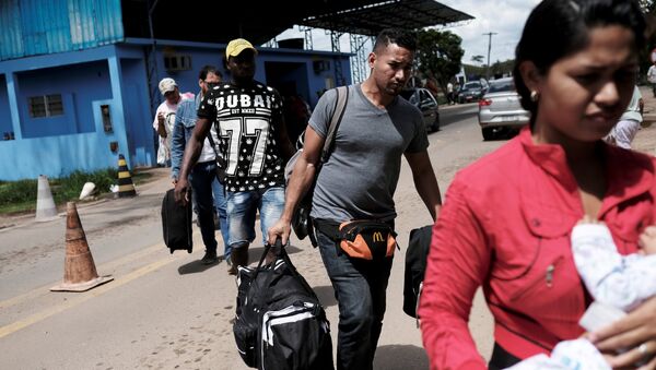 Migrantes venezolanos en la frontera de Brasil - Sputnik Mundo