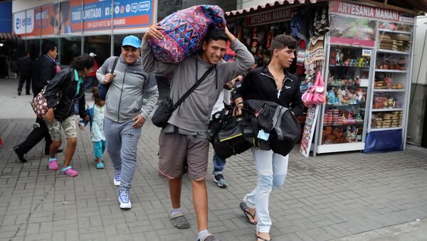 Los migrantes venezolanos en Perú - Sputnik Mundo