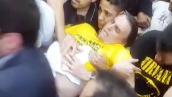 Jair Bolsonaro, candidato a la Presidencia de Brasil, tras ser herido por arma blanca durante un acto de campaña en Juiz de Fora - Sputnik Mundo