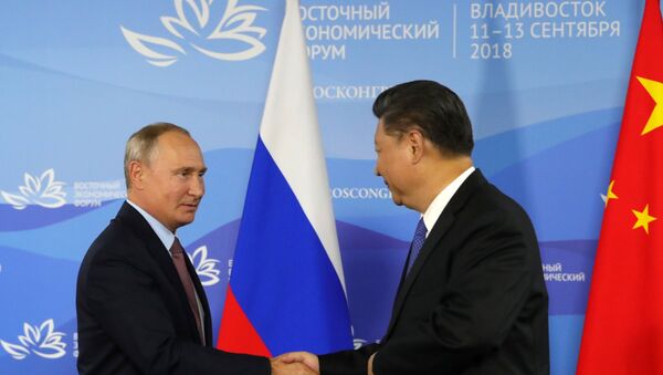 El presidente de Rusia, Vladímir Putin, y el presidente de China, Xi Jinping - Sputnik Mundo