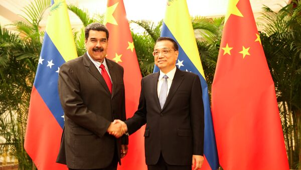 El presidente de Venezuela, Nicolás Maduro, y el primer ministro chino, Li Keqiang en Beijing, China - Sputnik Mundo