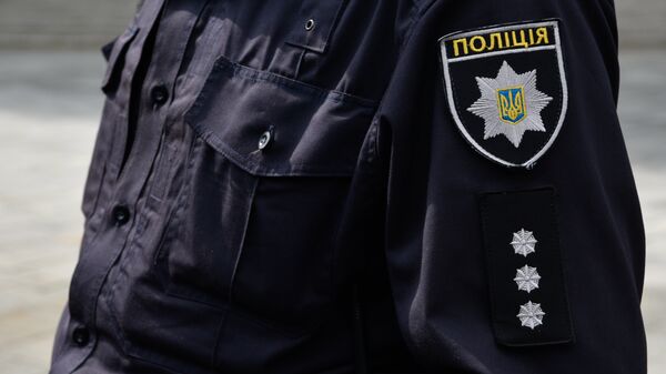 Un miembro de la Policía Nacional de Ucrania, en Kiev (archivo) - Sputnik Mundo