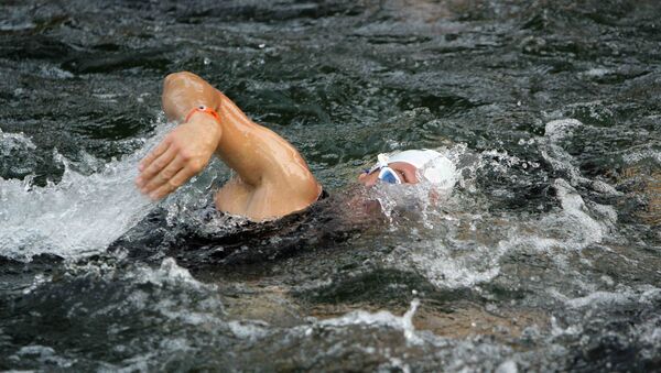 Un nadador, foto archivo - Sputnik Mundo