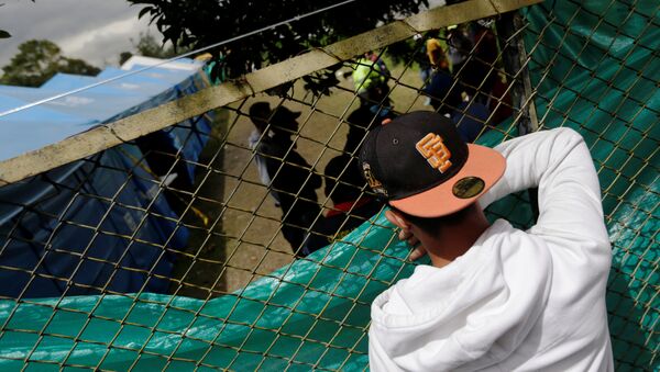 Un migrante venezolano en Colombia - Sputnik Mundo