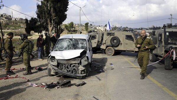 Situación tras el atropello intencionado por parte de un conductor palestino en Gush Etzion, en Cisjordania, territorio palestino ocupado por Israel - Sputnik Mundo