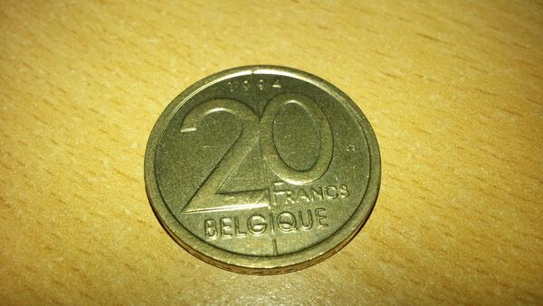 Una moneda de 20 francos belgas - Sputnik Mundo