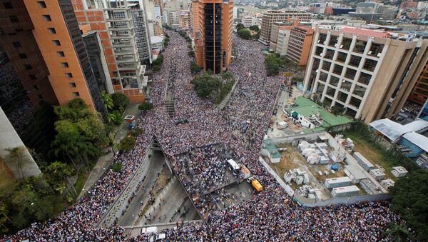 Manifestación en Caracas - Sputnik Mundo