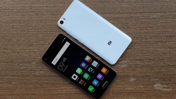 Unos celulares de la marca Xiaomi, foto archivo - Sputnik Mundo