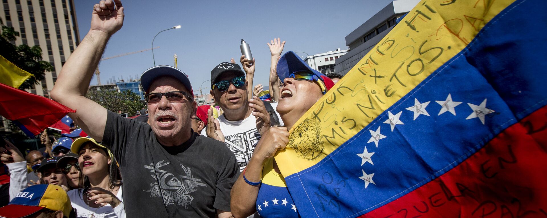 Las dos caras de Caracas: las manifestaciones con los partidarios de Maduro y Guaidó - Sputnik Mundo, 1920, 14.07.2021