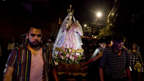 Una de las procesiones en el pueblo de la Candelaria, en Ciudad de México, el día de su santa patrona. - Sputnik Mundo