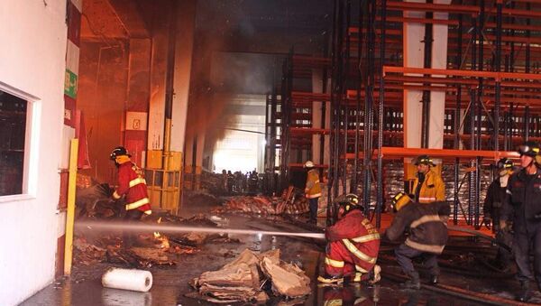 Incendio en un depósito de alimentos en Vargas, Venezuela - Sputnik Mundo