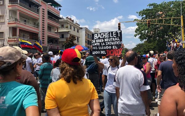 Participantes de la marcha opositora en Caracas Participantes de la marcha opositora en Caracas - Sputnik Mundo