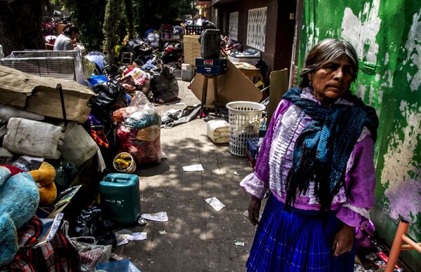 Mujer de la comunidad Otomí desalojada de la de antigua embajada de la República Española en Ciudad de México. Mujer de la comunidad Otomí desalojada de la de antigua embajada de la República Española en Ciudad de México. - Sputnik Mundo
