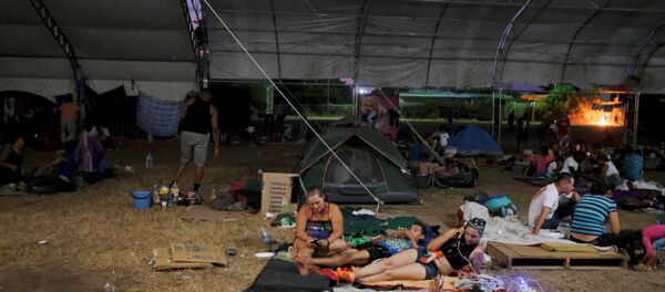 Migrantes centroamericanos en Mapastepec, Chiapas, México Migrantes centroamericanos en Mapastepec, Chiapas, México - Sputnik Mundo