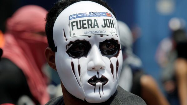 Una protesta antigubernamental en Honduras - Sputnik Mundo