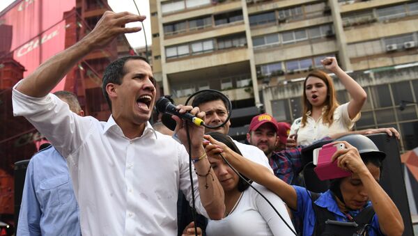 El líder opositor venezolano Juan Guaidó en un acto en Caracas - Sputnik Mundo