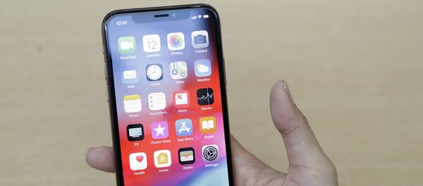 Un iPhone XS Un iPhone XS - Sputnik Mundo