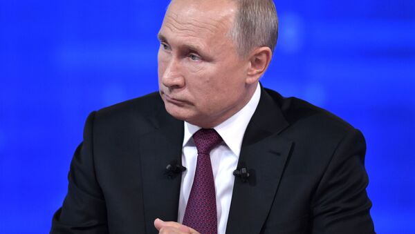 Vladímir Putin, presidente de Rusia, durante la Línea Directa de 2019 - Sputnik Mundo