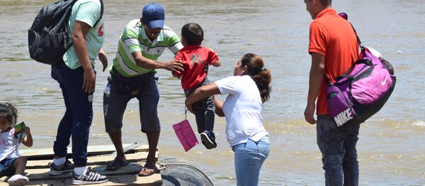 Unicef presenta modelo de cuidados alternativos para niños migrantes en  México , Sputnik Mundo