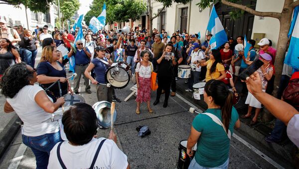 Manifestación contra la política migratoria de Trump en Guatemala - Sputnik Mundo
