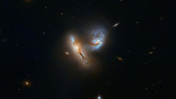 El dúo dos galaxias UGC 2369 se toca por primera vez - Sputnik Mundo