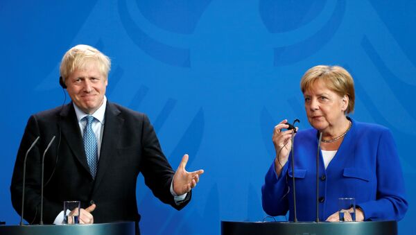 Angela Merkel y Boris Johnson - Sputnik Mundo