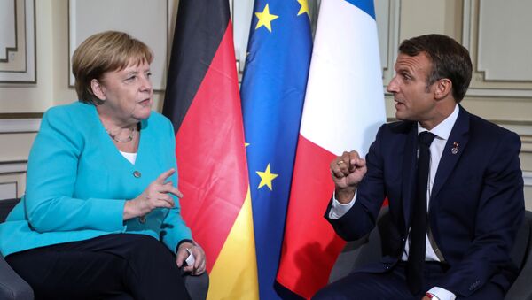 Angela Merkel, canciller de Alemania, y Emmanuel Macron,  el presidente de Francia - Sputnik Mundo