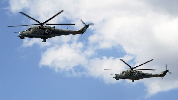 Los helicópteros Mi-24 participan en un entrenamiento - Sputnik Mundo