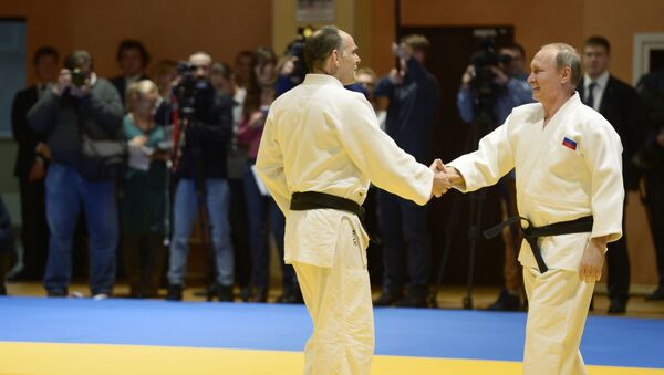 El entrenador de la selección rusa de judo Ezio Gamba y el presidente de Rusia, Vladímir Putin - Sputnik Mundo