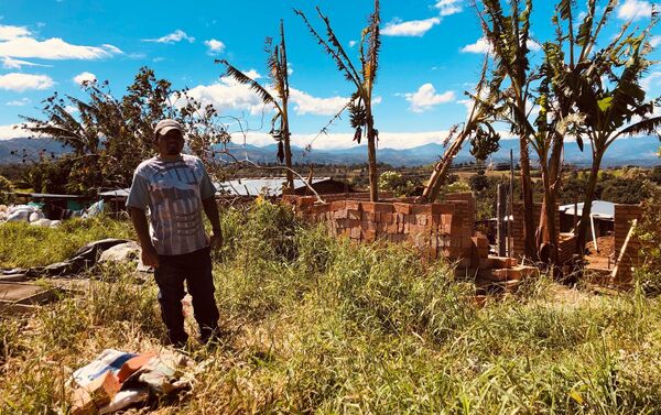 Andrés, un campesinos colombiano en el Departamento del Cauca Andrés, un campesinos colombiano en el Departamento del Cauca - Sputnik Mundo
