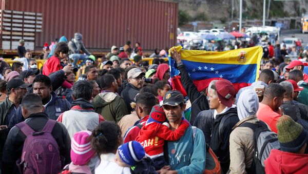 Venezolanos en la frontera de Ecuador - Sputnik Mundo