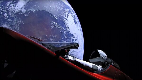 El auto Tesla en la órbita terrestre (archivo) - Sputnik Mundo