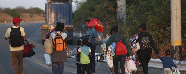 Migrantes venezolanos en Perú Migrantes venezolanos en Perú - Sputnik Mundo