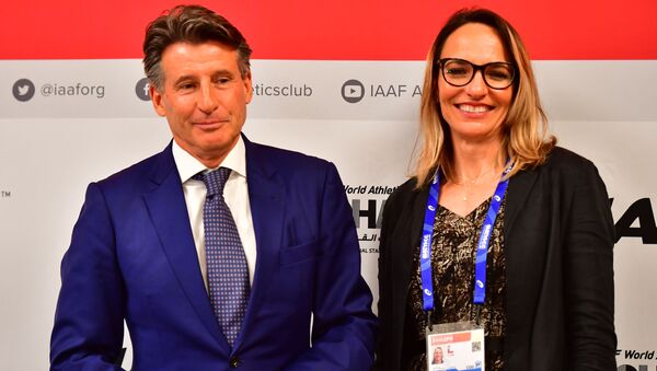 Ximena Restrepo, vicepresidenta de la Asociación Internacional de Federaciones de Atletismo junto al presidente de la Asociación, Sebastian Coe - Sputnik Mundo