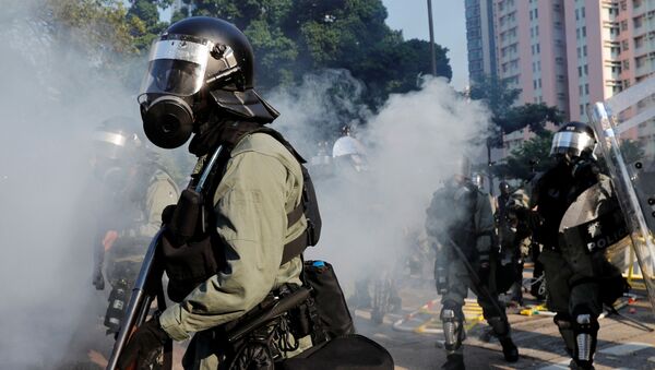 La Policía en las protestas en Hong Kong - Sputnik Mundo