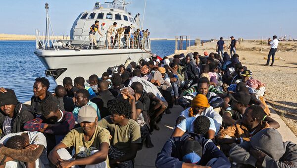 Migrantes de Libya - Sputnik Mundo
