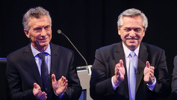 El presidente argentino Mauricio Macri y el candidato opositor Alberto Fernández - Sputnik Mundo
