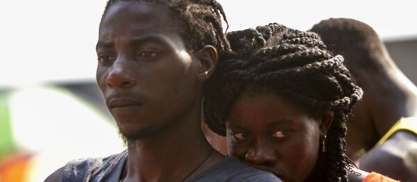 Haitianos fuera de la Estación migratoria Siglo XXI de Tapachula, Chiapas, en abril de 2019 Haitianos fuera de la Estación migratoria Siglo XXI de Tapachula, Chiapas, en abril de 2019 - Sputnik Mundo