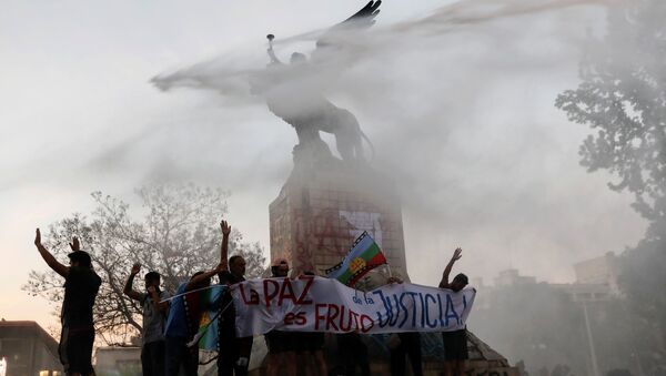 Las protestas en Chile - Sputnik Mundo