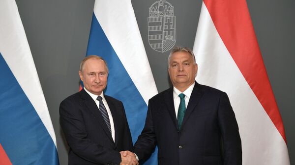 El presidente de Rusia, Vladímir Putin, y el primer ministro de Hungría, Viktor Orban - Sputnik Mundo