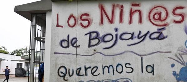 La inscripción Los niños de Bojayá queremos paz La inscripción Los niños de Bojayá queremos paz - Sputnik Mundo