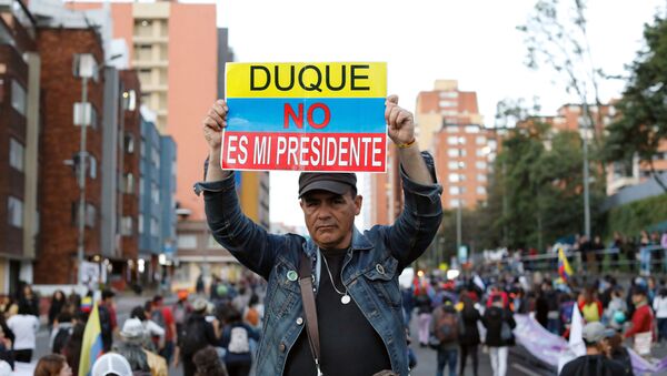 Manifestación contra el presidente de Colombia, Ivan Duque, en Bogotá, el 25 de noviembre de 2019 - Sputnik Mundo
