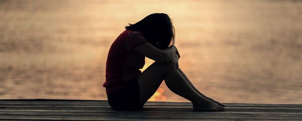 Una mujer triste (imagen referencial) Una mujer triste (imagen referencial) - Sputnik Mundo
